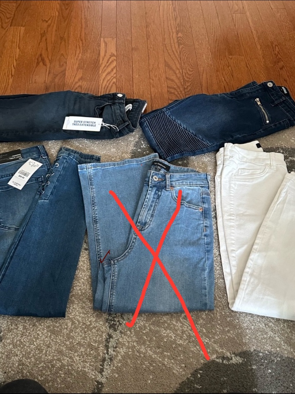 Lot 4 brand new jeans - bulk clothing for keeping or reselling